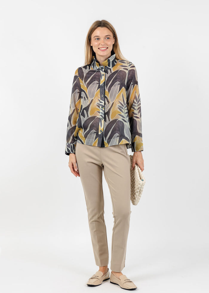 Terra Abstract Tropical Leaf Blouse in Midnight paired with Peace of Cloth Annie 29" Paramount Knit Pants in Oat available at Barbara Katz
