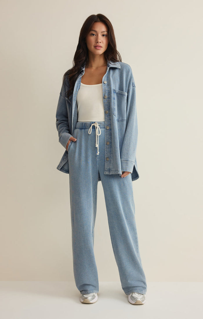 Z Supply All Day Knit Denim Jacket in Ocean Air Indigo paired with matching Z Supply Hunter Knit Denim Pants available at Barbara Katz