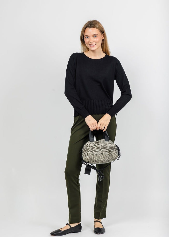 J Society Fall Rib Bottom Crew Sweater in Black paired with Peace of Cloth Annie 29" Paramount Knit Pants in Olive available at Barbara Katz