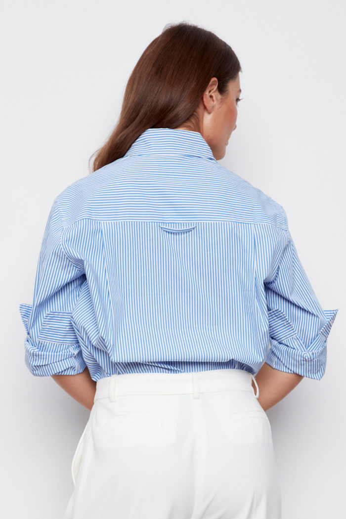 Adroit Atelier Bradley Long Sleeve Button-Front Shirt With Side Slits in Blue/White Stripe available at Barbara Katz