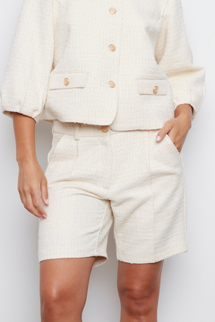 Adroit Atelier Calvin Textured Woven Shorts With Front Pleats in Cream available at Barbara Katz