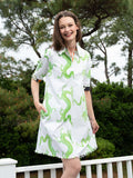 Dizzy-Lizzie Chatham Dress in Green and White Dragon Print available at Barbara Katz