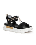 Nero Giardini Bungee Platform Flat Sandal in Black available atBarbara Katz