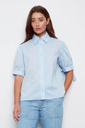 Adroit Atelier Clara Short Sleeve Buttoned Shirt in Light Blue available at Barbara Katz