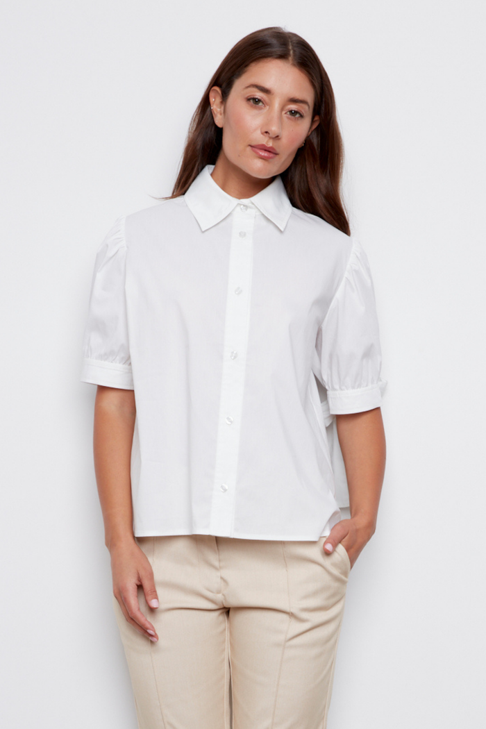 Adroit Atelier Clara Short Sleeve Buttoned Shirt in White available at Barbara Katz