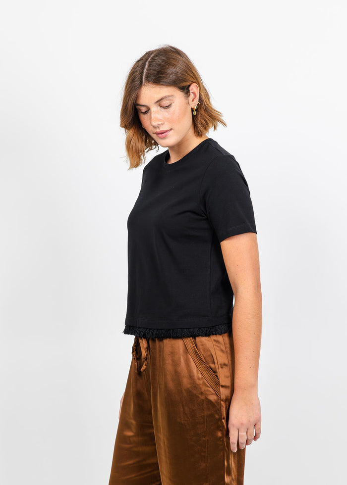 Margittes Fringe Hem Short Sleeve Tee in Black available at Barbara Katz