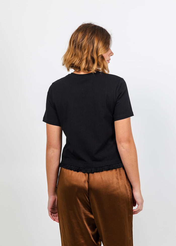 Margittes Fringe Hem Short Sleeve Tee in Black available at Barbara Katz