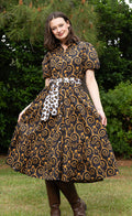 Dizzy-Lizzie Litchfield Dress - Black and Gold Swirl Print available at Barbara Katz