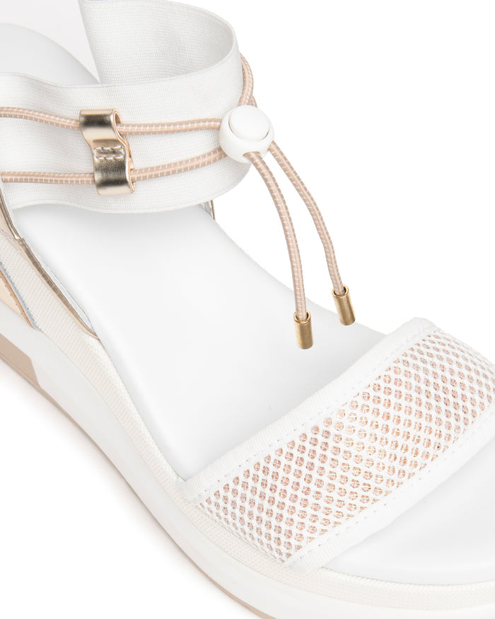 Nero Giardini Bungee Platform Wedge Sandals in White available at Barbara Katz