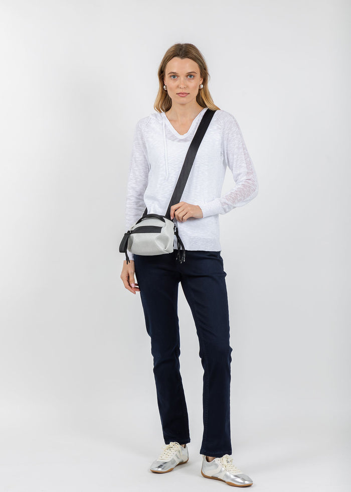 Elliott Lauren Boardwalk Hoodie Sweater With Mesh Detail in White paired with Wonderjeans Pull-On Ankle Jean 27" in Blue Used available at Barbara Katz