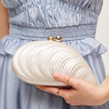 BK Handbags Robyn Shell Clutch Bag in Ivory available at Barbara Katz