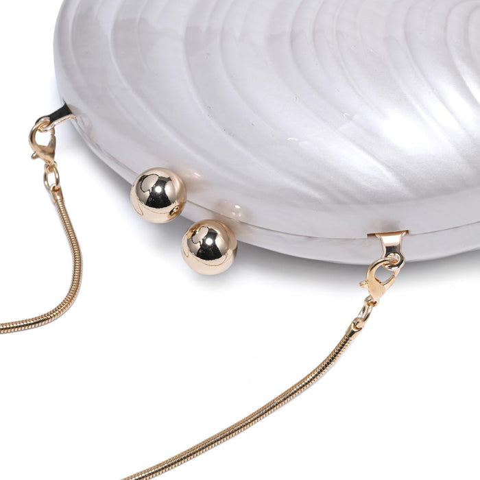 BK Handbags Robyn Shell Clutch Bag in Ivory available at Barbara Katz