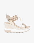 NeroGiardini Satcha Bungee Platform Wedge Sandal in Gold available at Barbara Katz