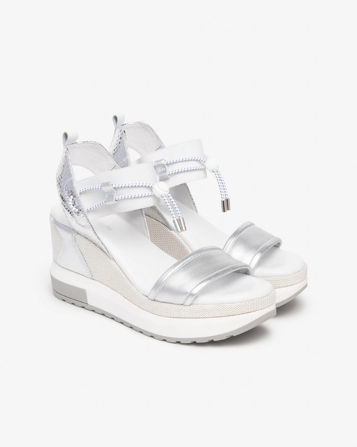 NeroGiardini Satcha Bungee Platform Wedge Sandal in Silver available at Barbara Katz