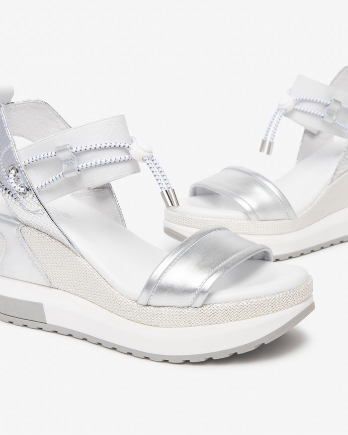 NeroGiardini Satcha Bungee Platform Wedge Sandal in Silver available at Barbara Katz