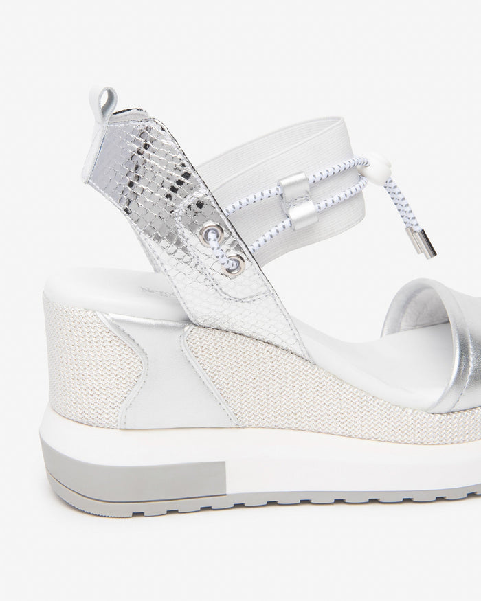 NeroGiardini Satcha Bungee Platform Wedge Sandal in Silver available at Barbara Katz