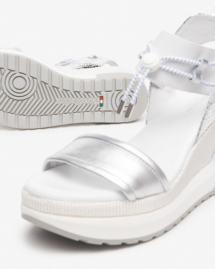 NeroGiardini Satcha Bungee Platform Wedge Sandal in Silver available at Barbara Katz