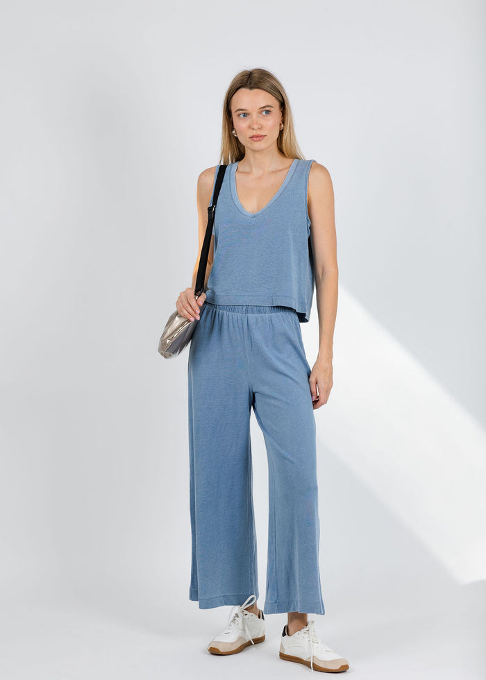 Z Supply Sloane V-Neck Denim Tank Top in Santorini Indigo paired with matching Scout Jersey Denim Pants available at Barbara Katz