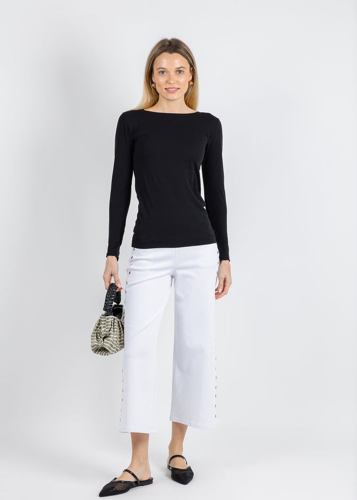 AMB Solid Raw Edge High Neck Second Skin Top in Black paired with Lysse Willa Scallop Studded Crop Jeans in White available at Barbara Katz