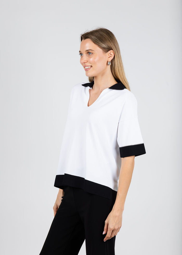 D. Exterior Split Neck Polo Sweater in Bianco/Nero available at Barbara Katz