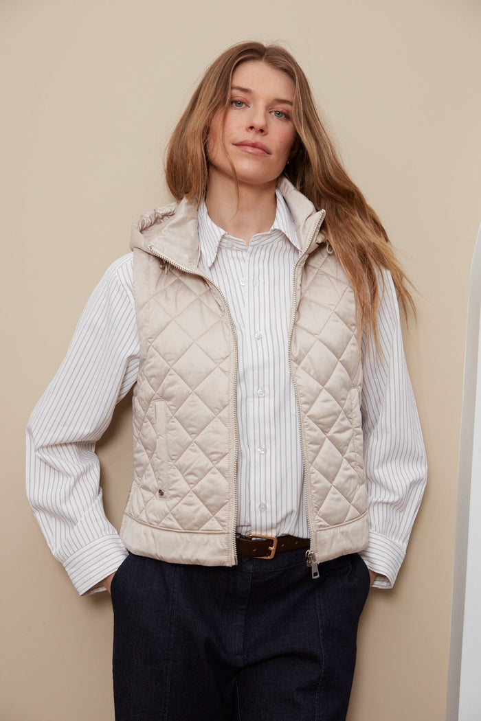 Adroit Atelier Talia Quilted Gilet With Removable Hood in Birch available at Barbara Katz