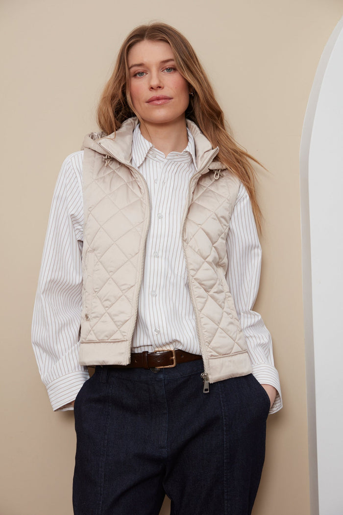 Adroit Atelier Talia Quilted Gilet With Removable Hood in Birch available at Barbara Katz