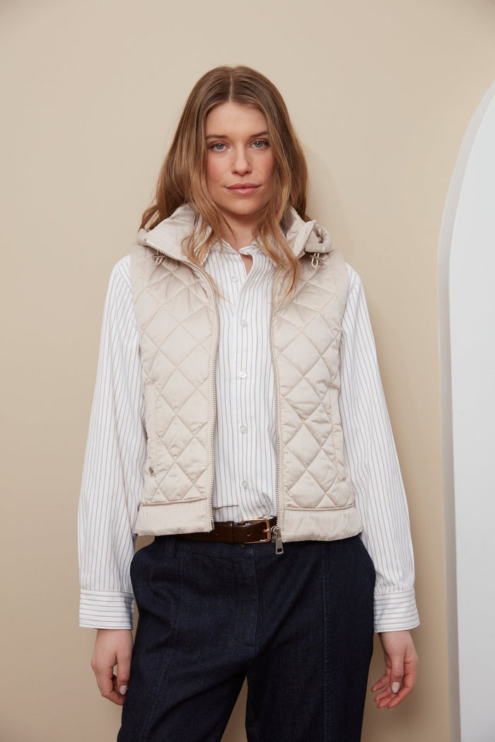 Adroit Atelier Talia Quilted Gilet With Removable Hood in Birch available at Barbara Katz
