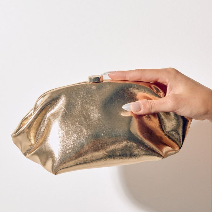 Olga Berg Tally Metallic Clutch in Gold available at Barbara Katz
