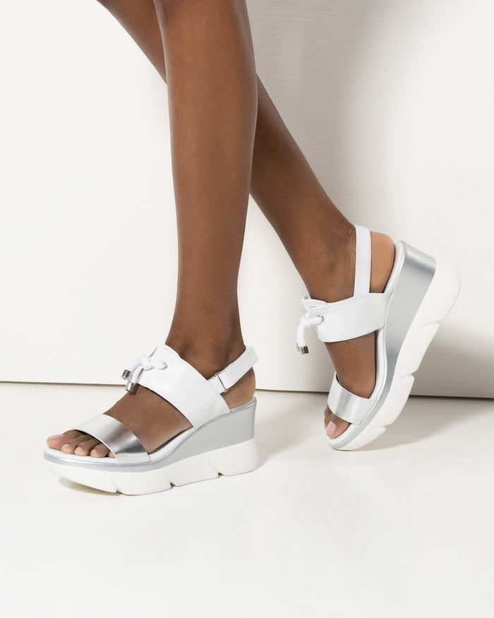 NeroGiardini Tati Bungee Platform Sport Wedge Sandals in White/Silver available at Barbara Katz