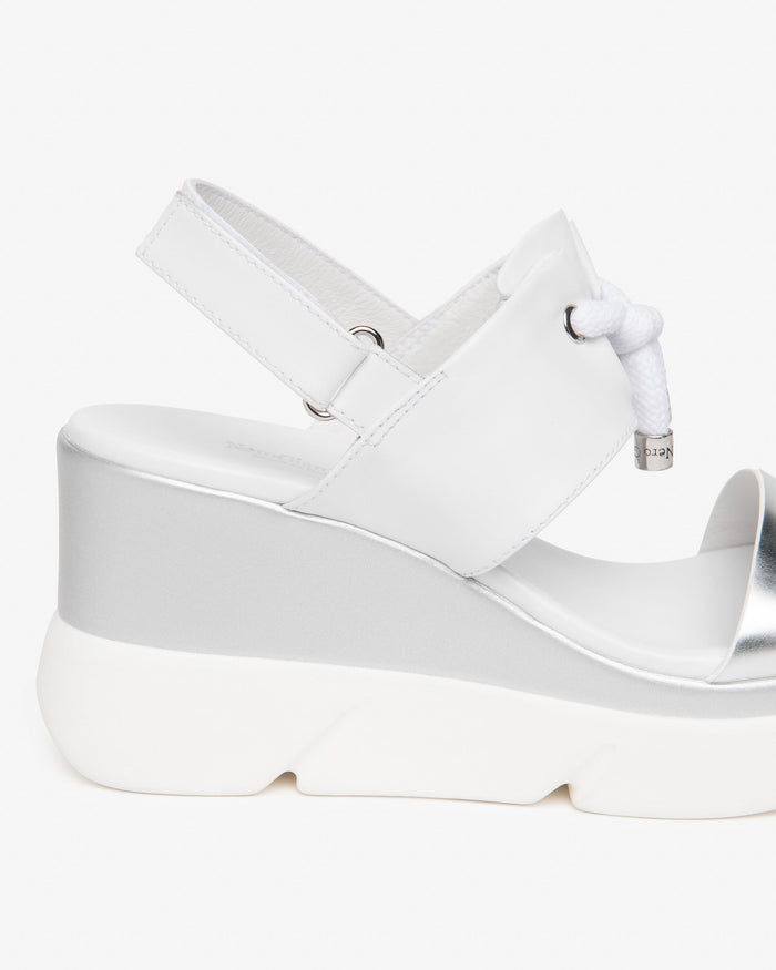NeroGiardini Tati Bungee Platform Sport Wedge Sandals in White/Silver available at Barbara Katz
