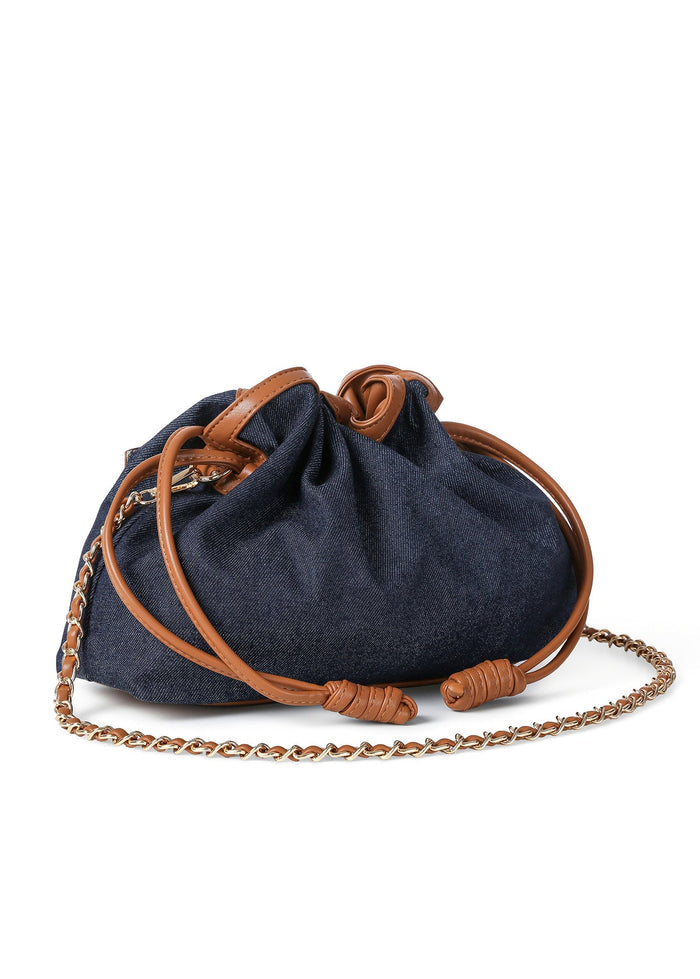 Haute Shore Taylor Cinched Convertible Clutch Bag in Denim available at Barbara Katz