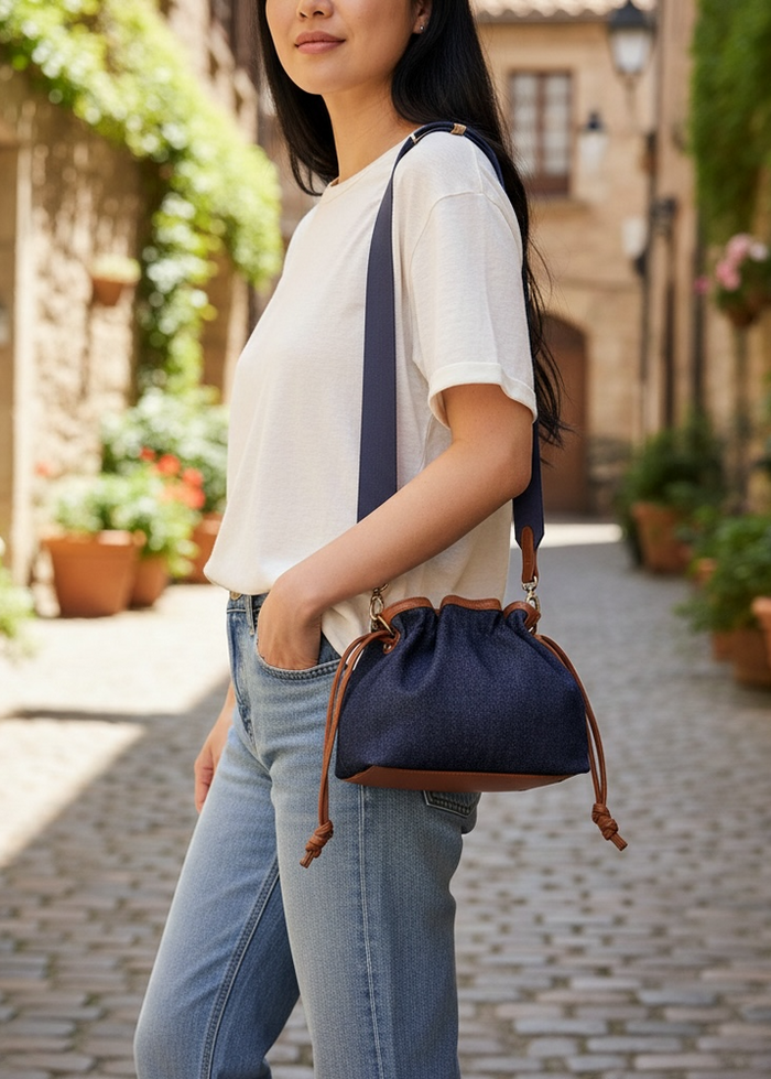 Haute Shore Taylor Cinched Convertible Clutch Bag in Denim available at Barbara Katz