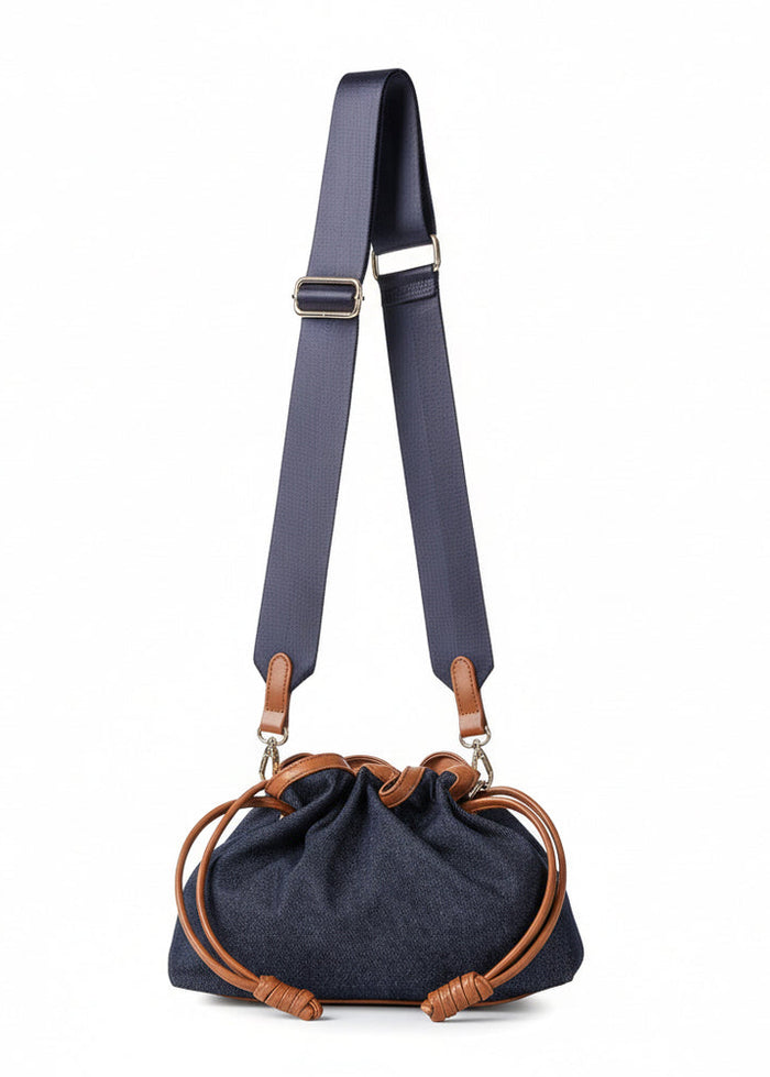 Haute Shore Taylor Cinched Convertible Clutch Bag in Denim available at Barbara Katz