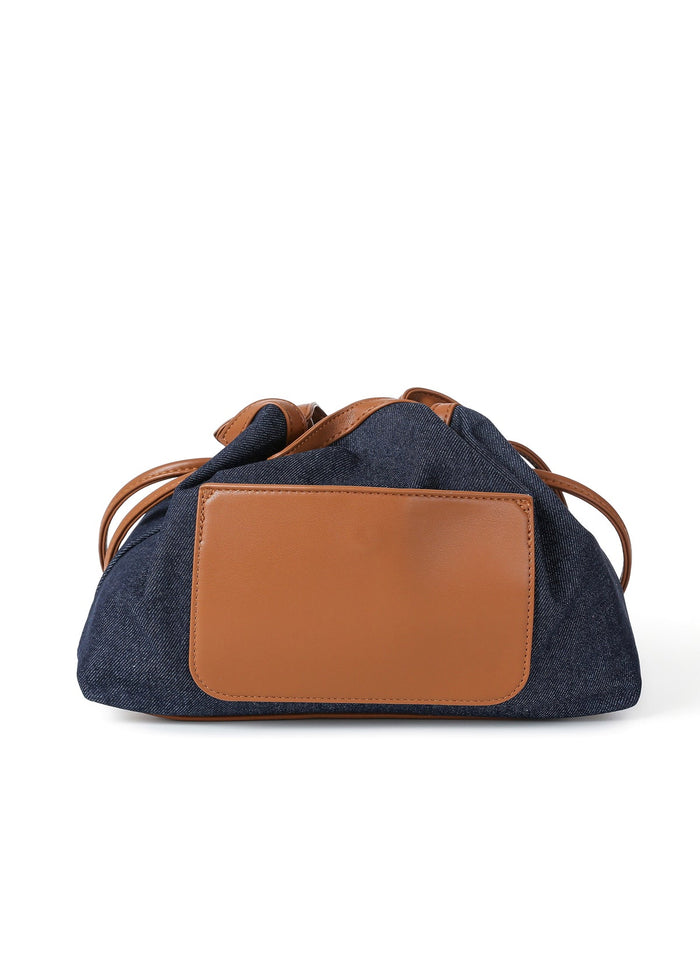 Haute Shore Taylor Cinched Convertible Clutch Bag in Denim available at Barbara Katz