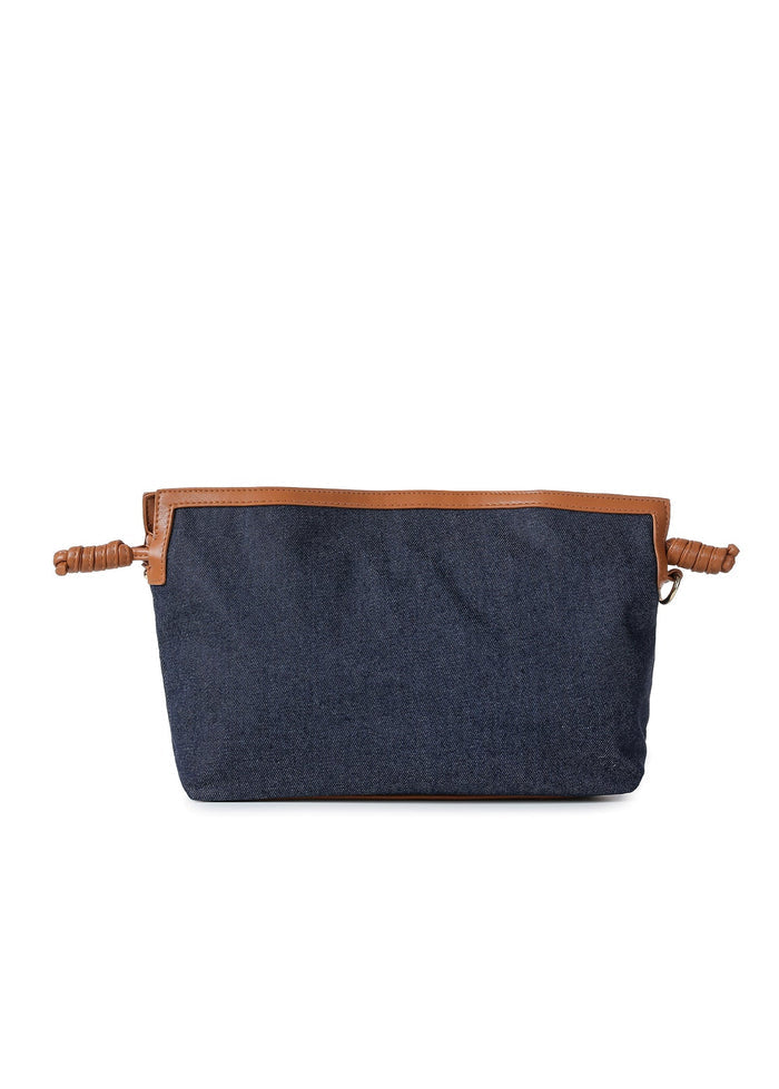 Haute Shore Taylor Cinched Convertible Clutch Bag in Denim available at Barbara Katz