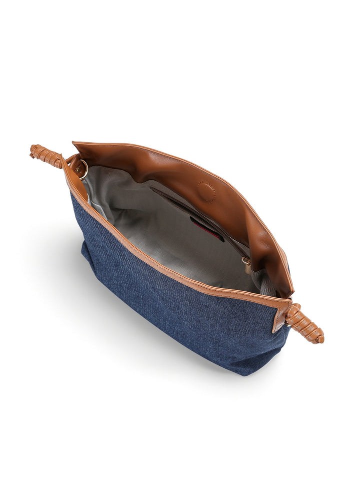 Haute Shore Taylor Cinched Convertible Clutch Bag in Denim available at Barbara Katz