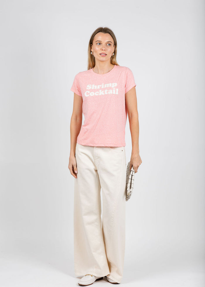 Mother The Boxy Goodie Goodie Tee in Shrimp Cocktail paired with Mother The Lil Lemon Twist Sneak Jeans in Natural available at Barbara Katz
