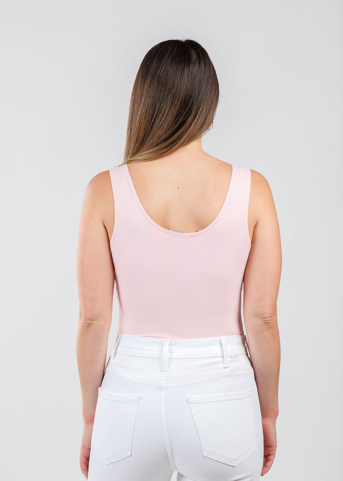 A'NUE The Classic Micro Tank Top in Ballet Slipper featuring a scoop neckline, wide shoulder straps, form-fitting fit, travel-friendly style available at Barbara Katz.