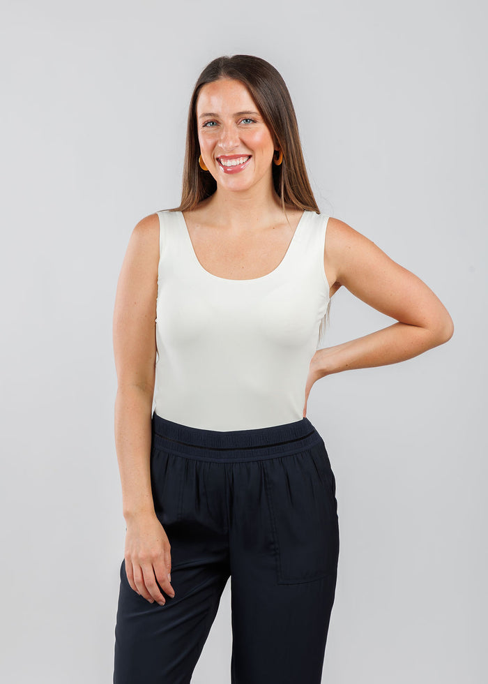 A'NUE The Classic Micro Tank Top in Cream featuring a scoop neckline, wide shoulder straps, form-fitting fit, travel-friendly style available at Barbara Katz.