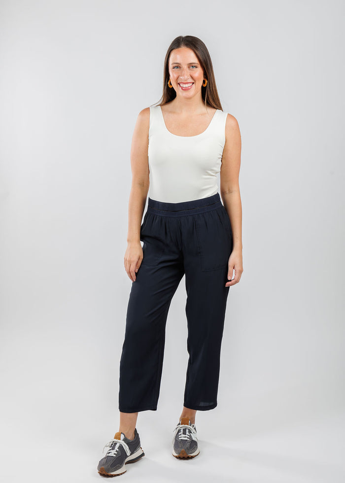 A'NUE The Classic Micro Tank Top in Cream featuring a scoop neckline, wide shoulder straps, form-fitting fit, travel-friendly style available at Barbara Katz.