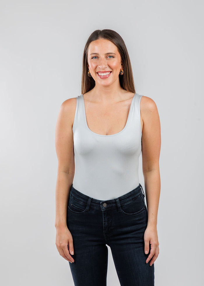A'NUE The Classic Micro Tank Top in Platinum featuring a scoop neckline, wide shoulder straps, form-fitting fit, travel-friendly style available at Barbara Katz.