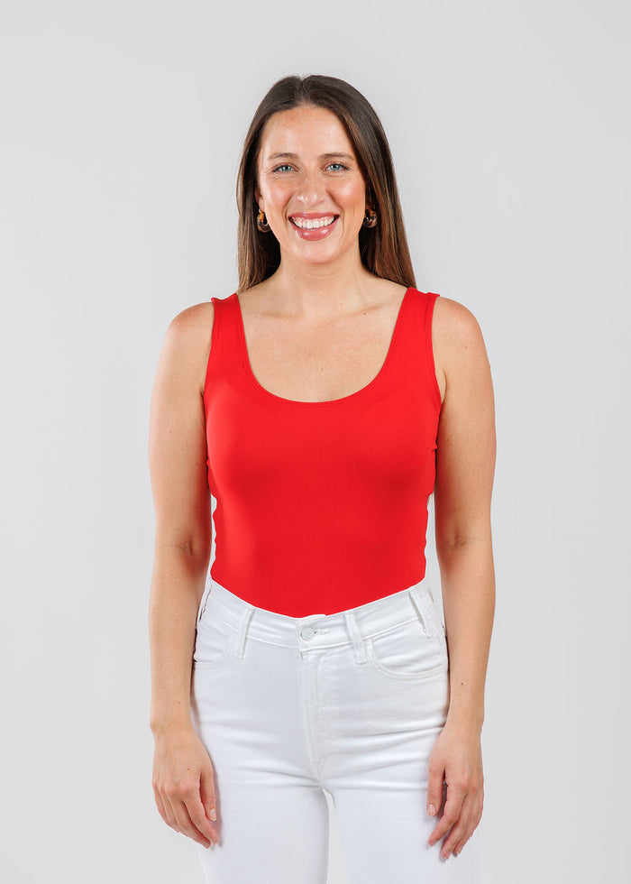 A'NUE The Classic Micro Tank Top in Red featuring a scoop neckline, wide shoulder straps, form-fitting fit, travel-friendly style available at Barbara Katz.
