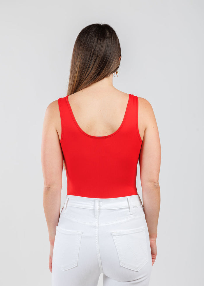 A'NUE The Classic Micro Tank Top in Red featuring a scoop neckline, wide shoulder straps, form-fitting fit, travel-friendly style available at Barbara Katz.